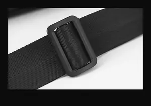 Detail of adjustable black nylon shoulder strap with a durable square plastic buckle