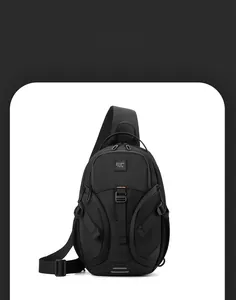 Detail of black crossbody chest bag showing durable fabric and tactical buckle system