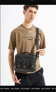 Detailed view of the large capacity camouflage crossbody bag with adjustable strap on model
