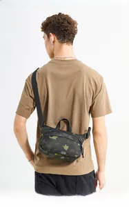Detail view of men's camouflage crossbody bag showing durable fabric and adjustable strap