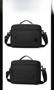 Macro detail of waterproof nylon texture and multi-zipper compartments on black crossbody bag
