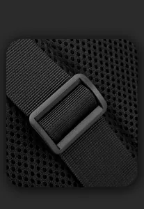 Detail of nylon shoulder strap with adjustable plastic buckle on breathable mesh backpack