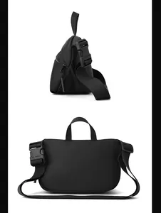 Detail of black tactical chest bag showing durable nylon texture and branded buckle