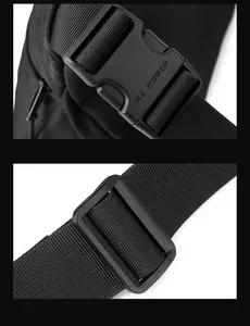 Detail of high-strength plastic buckle and nylon strap on a minimalist black crossbody bag
