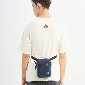 Men's navy nylon crossbody sling bag with adjustable strap and sport logo detail
