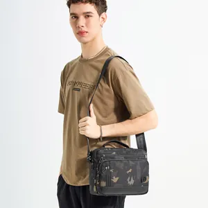 Men's camouflage crossbody bag with large capacity and adjustable nylon strap on a model