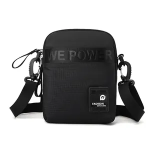 Men's versatile black nylon crossbody bag with adjustable shoulder strap and zip compartments