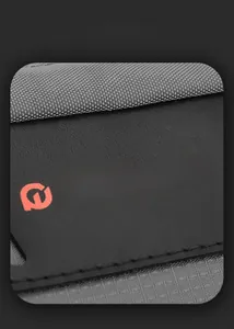 Macro shot of honeycomb fabric and leather brand label on the waterproof sling bag