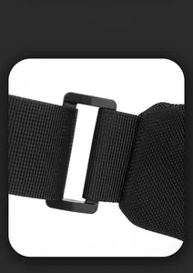 Detail of adjustable nylon strap and plastic buckle for a versatile black waist bag