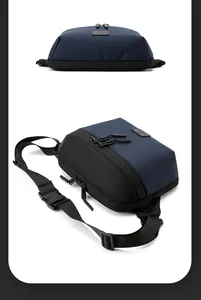 Detail view of water-resistant nylon waist bag with zippers and adjustable buckle