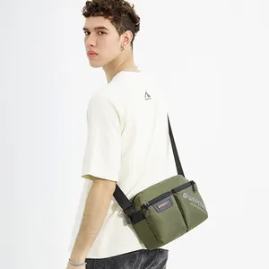 Men's olive green canvas messenger bag with multi-pockets and adjustable shoulder strap