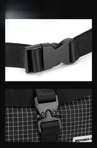 Detail view of the durable nylon fabric, plastic buckle and tactical strap on the bag