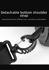 Detail of the detachable plastic swivel hook and nylon shoulder strap on the grey bag