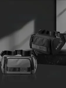 Detail of waterproof nylon waist bags in black and grey with secure buckles and zippers