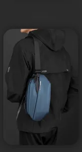 Detail of smart storage crossbody chest bag for men in navy waterproof material