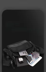 Internal storage detail of waterproof sports waist bag showing multi-pocket capacity