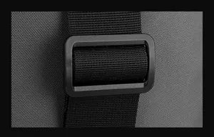 Macro shot of durable black nylon strap with high-quality plastic adjustment buckle