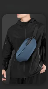 Detail of waterproof geometric blue crossbody chest bag with adjustable shoulder strap