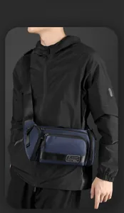 Detail of waterproof nylon waist bag with multi-layer zipper and smart storage space