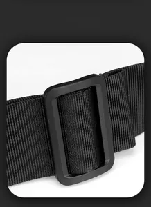 Detail of durable nylon shoulder strap and matte plastic adjustment buckle on black chest bag