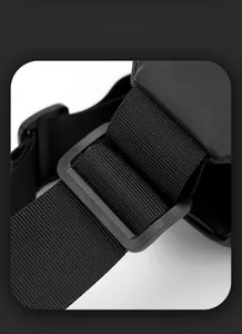 Macro view of high-density nylon strap and matte black adjustable buckle on chest bag