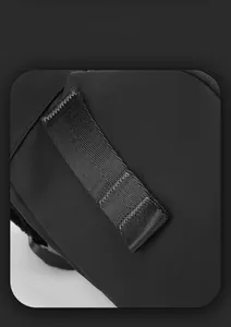 Detailed view of reinforced Z-stitch nylon webbing on black outdoor tactical waist bag