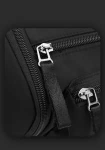 Macro shot of nylon fabric texture with metal zipper and smart storage space detail