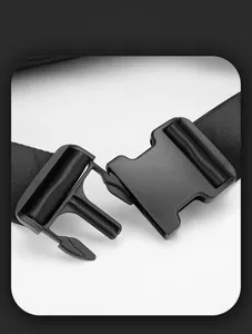 Macro view of durable matte black plastic buckle and high-density nylon webbing strap