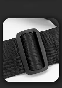 Close-up of high-density nylon strap and plastic adjustment buckle on black sports bag