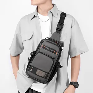 Modern grey men's chest bag with adjustable strap and Wepower logo on a grey shirt