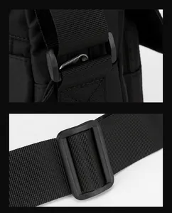 Close-up of black nylon strap stitching and matte buckle on tactical crossbody bag
