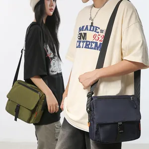 Large capacity functional crossbody bag in navy blue and olive green colors for men and women