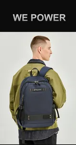 Detailed view of dark blue nylon backpack for men with adjustable shoulder straps and side pocket
