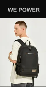 Detail view of the waterproof fabric texture and brand logo on a black men backpack
