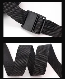 Detail of durable black nylon strap and matte plastic buckle on men's crossbody bag