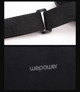 Close-up of adjustable woven strap and branding logo on black nylon crossbody bag