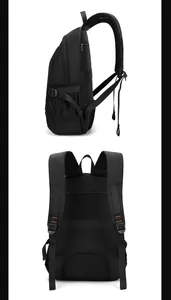 Detail view of ergonomic padded shoulder straps and breathable mesh back on black backpack