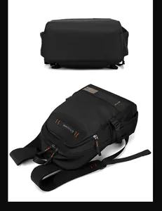 Detailed view of black laptop backpack featuring breathable mesh back and orange stitching