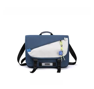 Front view of a blue and grey functional messenger bag with buckle straps and top handle