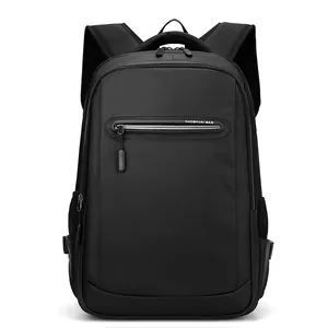 Water-resistant black laptop backpack with front zipper pocket and padded top handle