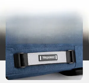 Close-up of durable navy canvas fabric with Wepower logo and reflective safety strap