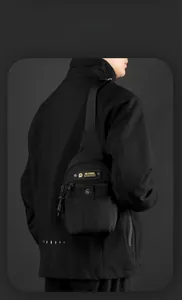 Close-up of waterproof nylon shoulder bag with WEPOWER label and secure zipper pockets