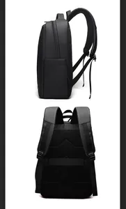 Ergonomic breathable mesh back and luggage strap detail on black business laptop backpack