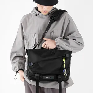 Men's large capacity black messenger bag with flap closure and adjustable straps