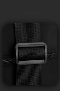 Detail of durable nylon fabric with adjustable buckle and smart storage zipper features