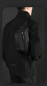 Detailed view of tactical chest bag with high-density nylon and orange zipper cords