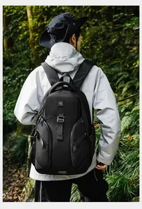 Close-up of durable black tactical backpack with TuPower logo and water-resistant nylon fabric