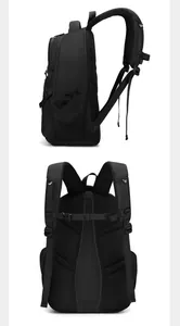 Detail of ergonomic breathable mesh back panel and adjustable chest straps on black backpack