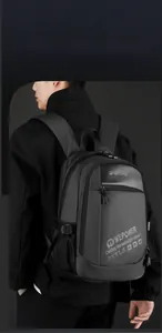 Detailed side view of high-capacity gray nylon backpack with adjustable mesh side pockets
