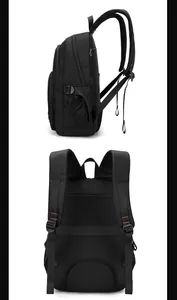 Detail view of black multi-layer backpack with breathable mesh straps and orange stitching